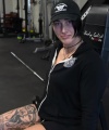 Rhea_Ripley_flexes_on_Sheamus_with_her__Nightmare__Arms_workout_0790.jpg