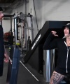 Rhea_Ripley_flexes_on_Sheamus_with_her__Nightmare__Arms_workout_0887.jpg