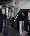 Rhea_Ripley_flexes_on_Sheamus_with_her__Nightmare__Arms_workout_0888.jpg