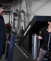 Rhea_Ripley_flexes_on_Sheamus_with_her__Nightmare__Arms_workout_0896.jpg