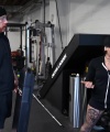 Rhea_Ripley_flexes_on_Sheamus_with_her__Nightmare__Arms_workout_0897.jpg