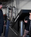 Rhea_Ripley_flexes_on_Sheamus_with_her__Nightmare__Arms_workout_0899.jpg
