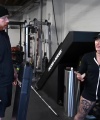 Rhea_Ripley_flexes_on_Sheamus_with_her__Nightmare__Arms_workout_0901.jpg