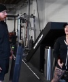 Rhea_Ripley_flexes_on_Sheamus_with_her__Nightmare__Arms_workout_0902.jpg