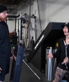 Rhea_Ripley_flexes_on_Sheamus_with_her__Nightmare__Arms_workout_0903.jpg