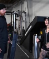 Rhea_Ripley_flexes_on_Sheamus_with_her__Nightmare__Arms_workout_0904.jpg