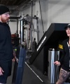 Rhea_Ripley_flexes_on_Sheamus_with_her__Nightmare__Arms_workout_0909.jpg