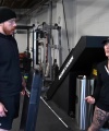 Rhea_Ripley_flexes_on_Sheamus_with_her__Nightmare__Arms_workout_0911.jpg