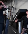 Rhea_Ripley_flexes_on_Sheamus_with_her__Nightmare__Arms_workout_0930.jpg