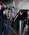 Rhea_Ripley_flexes_on_Sheamus_with_her__Nightmare__Arms_workout_0931.jpg