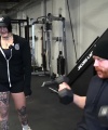 Rhea_Ripley_flexes_on_Sheamus_with_her__Nightmare__Arms_workout_1250.jpg