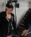 Rhea_Ripley_flexes_on_Sheamus_with_her__Nightmare__Arms_workout_1343.jpg