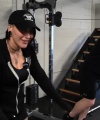 Rhea_Ripley_flexes_on_Sheamus_with_her__Nightmare__Arms_workout_1344.jpg
