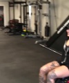 Rhea_Ripley_flexes_on_Sheamus_with_her__Nightmare__Arms_workout_1460.jpg
