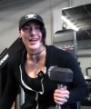 Rhea_Ripley_flexes_on_Sheamus_with_her__Nightmare__Arms_workout_1841.jpg