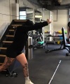 Rhea_Ripley_flexes_on_Sheamus_with_her__Nightmare__Arms_workout_2173.jpg