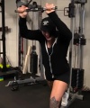 Rhea_Ripley_flexes_on_Sheamus_with_her__Nightmare__Arms_workout_2203.jpg