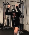 Rhea_Ripley_flexes_on_Sheamus_with_her__Nightmare__Arms_workout_2204.jpg