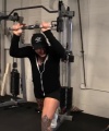 Rhea_Ripley_flexes_on_Sheamus_with_her__Nightmare__Arms_workout_2205.jpg