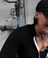 Rhea_Ripley_flexes_on_Sheamus_with_her__Nightmare__Arms_workout_2224.jpg