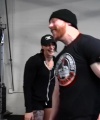 Rhea_Ripley_flexes_on_Sheamus_with_her__Nightmare__Arms_workout_2230.jpg