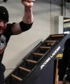 Rhea_Ripley_flexes_on_Sheamus_with_her__Nightmare__Arms_workout_2263.jpg