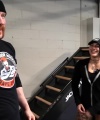 Rhea_Ripley_flexes_on_Sheamus_with_her__Nightmare__Arms_workout_2342.jpg