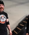 Rhea_Ripley_flexes_on_Sheamus_with_her__Nightmare__Arms_workout_2345.jpg