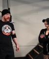 Rhea_Ripley_flexes_on_Sheamus_with_her__Nightmare__Arms_workout_2349.jpg