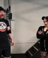 Rhea_Ripley_flexes_on_Sheamus_with_her__Nightmare__Arms_workout_2350.jpg