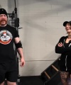 Rhea_Ripley_flexes_on_Sheamus_with_her__Nightmare__Arms_workout_2353.jpg