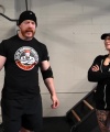Rhea_Ripley_flexes_on_Sheamus_with_her__Nightmare__Arms_workout_2355.jpg
