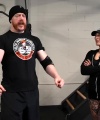 Rhea_Ripley_flexes_on_Sheamus_with_her__Nightmare__Arms_workout_2357.jpg