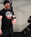 Rhea_Ripley_flexes_on_Sheamus_with_her__Nightmare__Arms_workout_2360.jpg