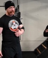 Rhea_Ripley_flexes_on_Sheamus_with_her__Nightmare__Arms_workout_2361.jpg