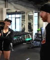 Rhea_Ripley_flexes_on_Sheamus_with_her__Nightmare__Arms_workout_2385.jpg