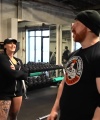 Rhea_Ripley_flexes_on_Sheamus_with_her__Nightmare__Arms_workout_2396.jpg