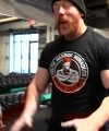 Rhea_Ripley_flexes_on_Sheamus_with_her__Nightmare__Arms_workout_2406.jpg