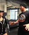 Rhea_Ripley_flexes_on_Sheamus_with_her__Nightmare__Arms_workout_2414.jpg