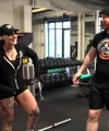 Rhea_Ripley_flexes_on_Sheamus_with_her__Nightmare__Arms_workout_2419.jpg