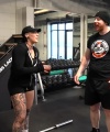 Rhea_Ripley_flexes_on_Sheamus_with_her__Nightmare__Arms_workout_2422.jpg