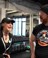 Rhea_Ripley_flexes_on_Sheamus_with_her__Nightmare__Arms_workout_2442.jpg