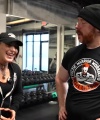Rhea_Ripley_flexes_on_Sheamus_with_her__Nightmare__Arms_workout_2444.jpg