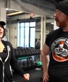 Rhea_Ripley_flexes_on_Sheamus_with_her__Nightmare__Arms_workout_2446.jpg