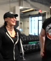 Rhea_Ripley_flexes_on_Sheamus_with_her__Nightmare__Arms_workout_2478.jpg