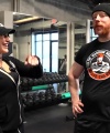 Rhea_Ripley_flexes_on_Sheamus_with_her__Nightmare__Arms_workout_2491.jpg