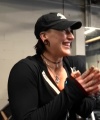 Rhea_Ripley_flexes_on_Sheamus_with_her__Nightmare__Arms_workout_2503.jpg