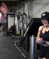 Rhea_Ripley_flexes_on_Sheamus_with_her__Nightmare__Arms_workout_2609.jpg