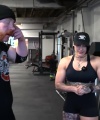 Rhea_Ripley_flexes_on_Sheamus_with_her__Nightmare__Arms_workout_2618.jpg