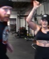 Rhea_Ripley_flexes_on_Sheamus_with_her__Nightmare__Arms_workout_2674.jpg